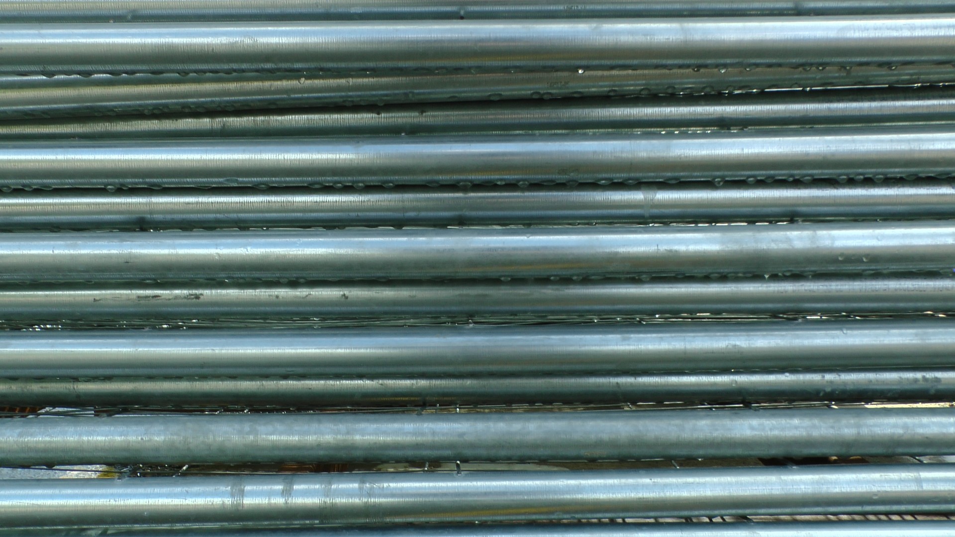 background horizontal aluminum pipes background aluminum free photo