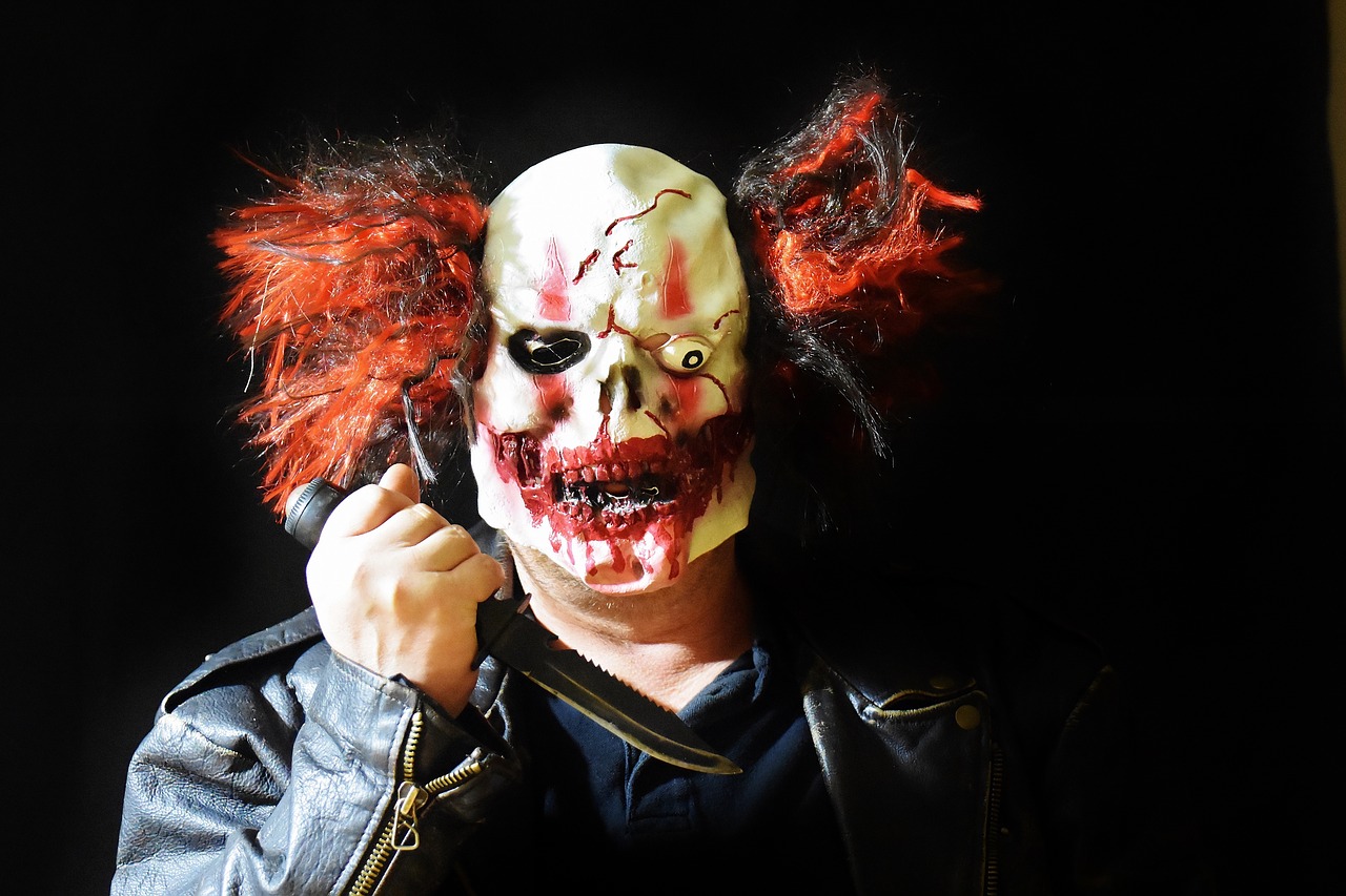 horror clown mass murderer knife free photo