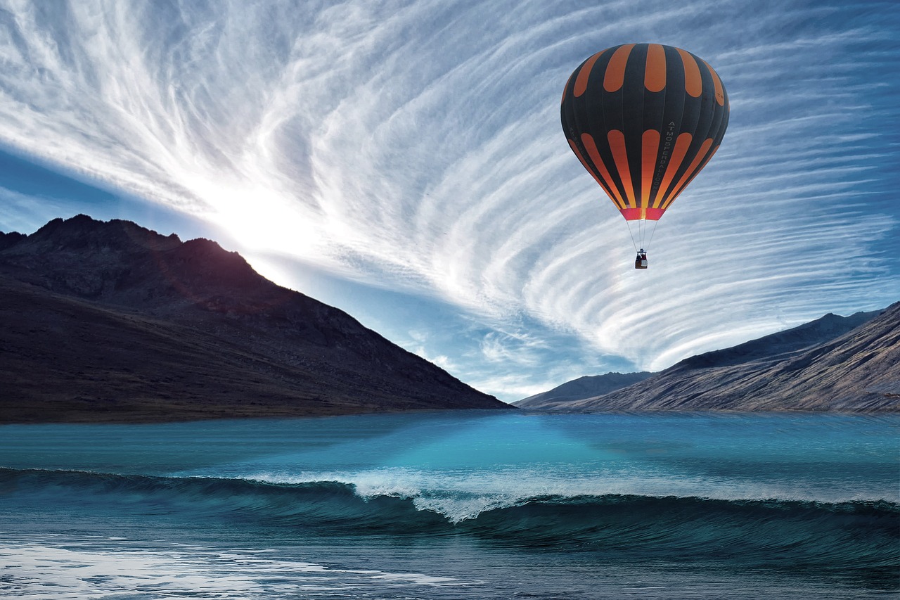 hot air balloon  balloon  sea free photo