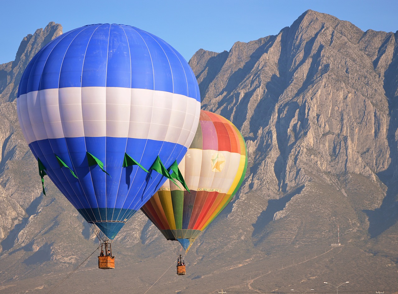 hot air balloon  colors  mountain free photo