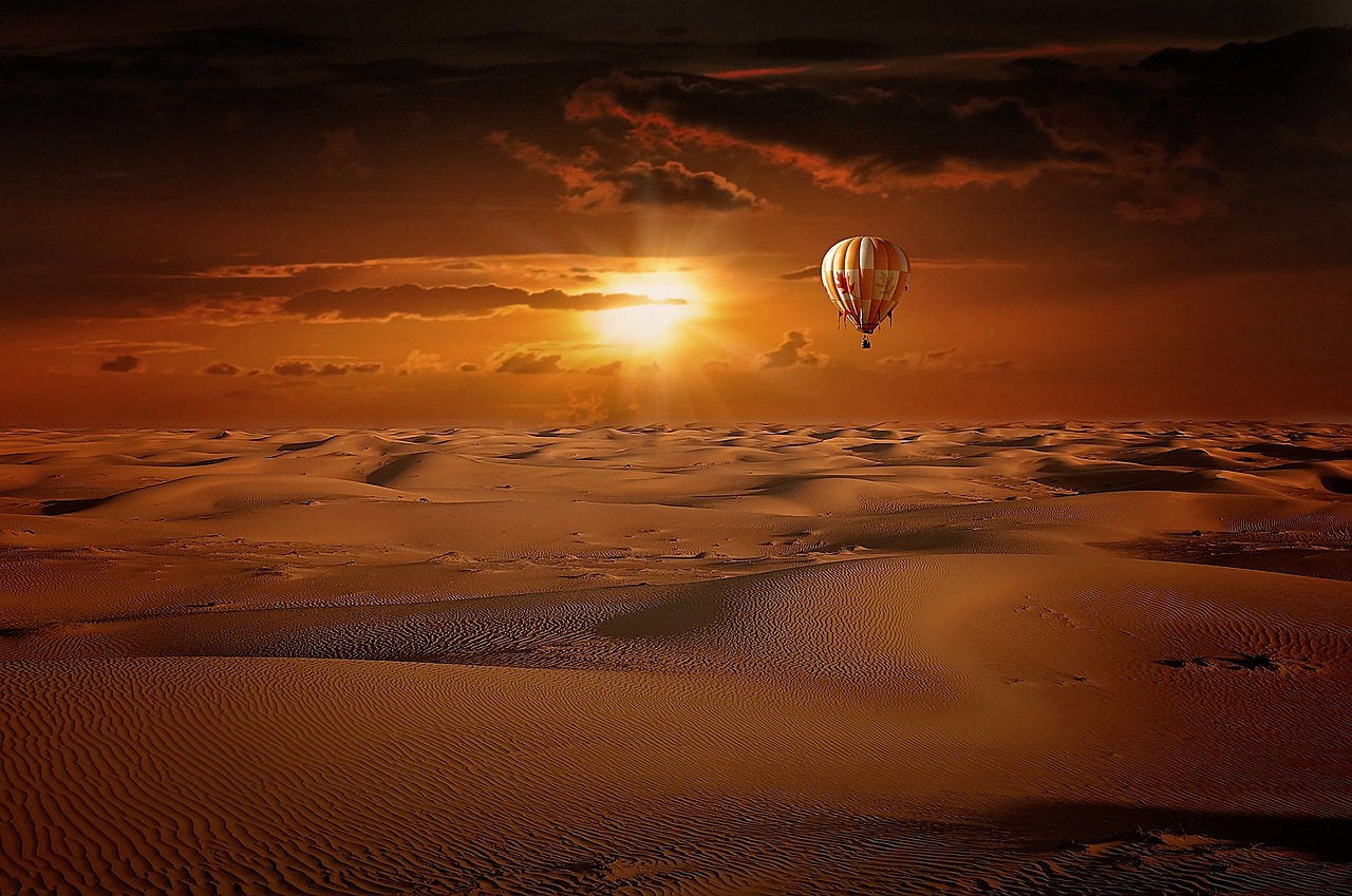 hot air balloon desert sand free photo