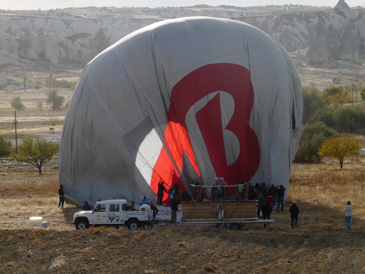 hot air balloon ride landing folding free photo