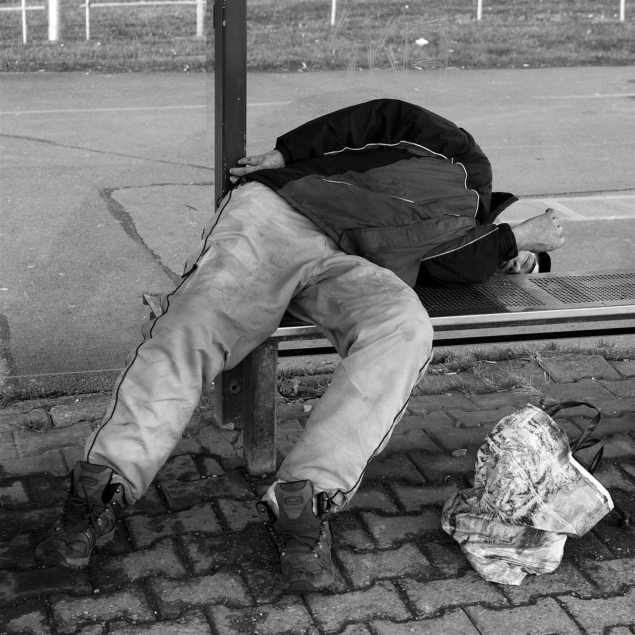 homeless man sleeping free photo