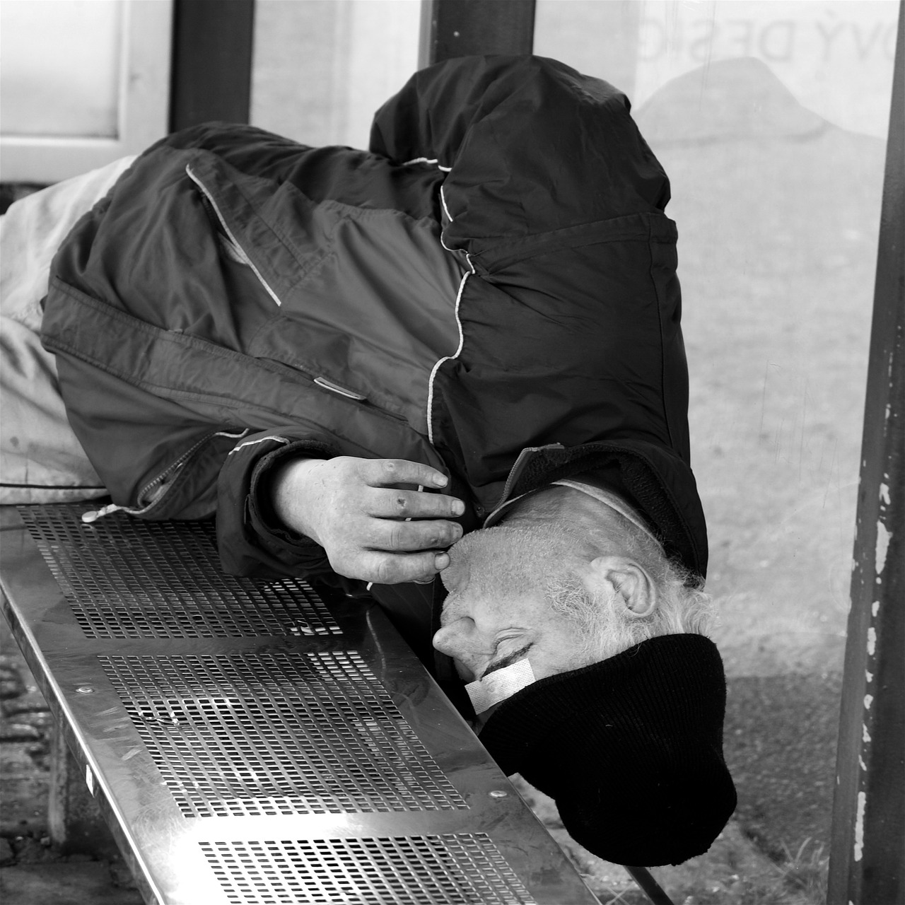 homeless man sleeping free photo