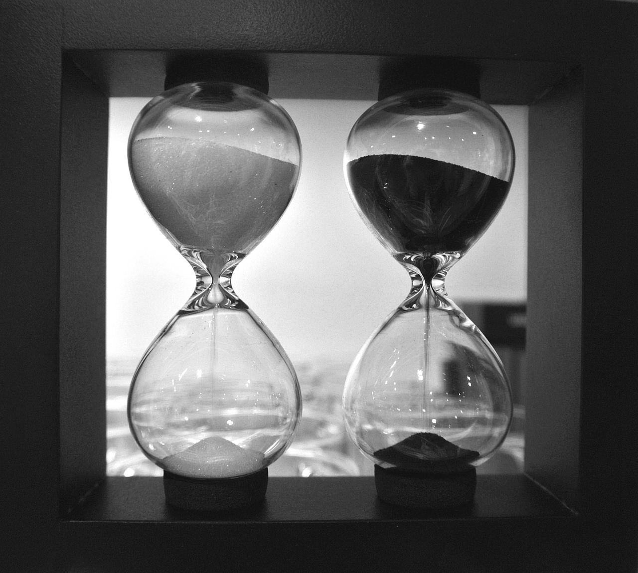 hourglass black and white comparison free photo