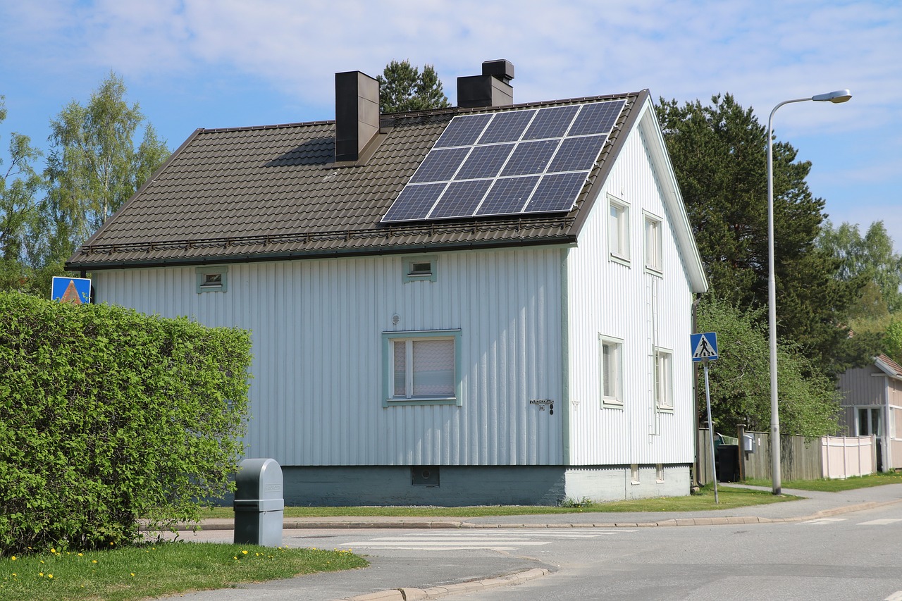 house  building  solar panel free photo