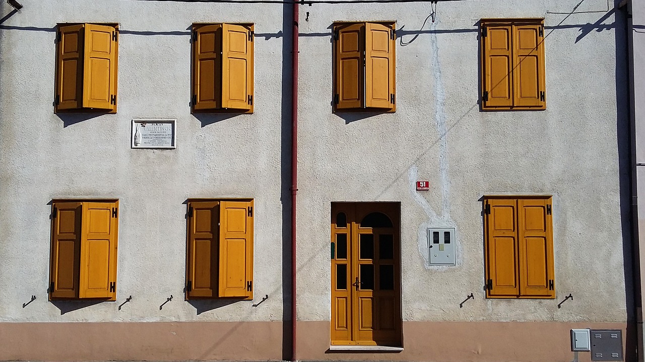 house windows yellow house free photo