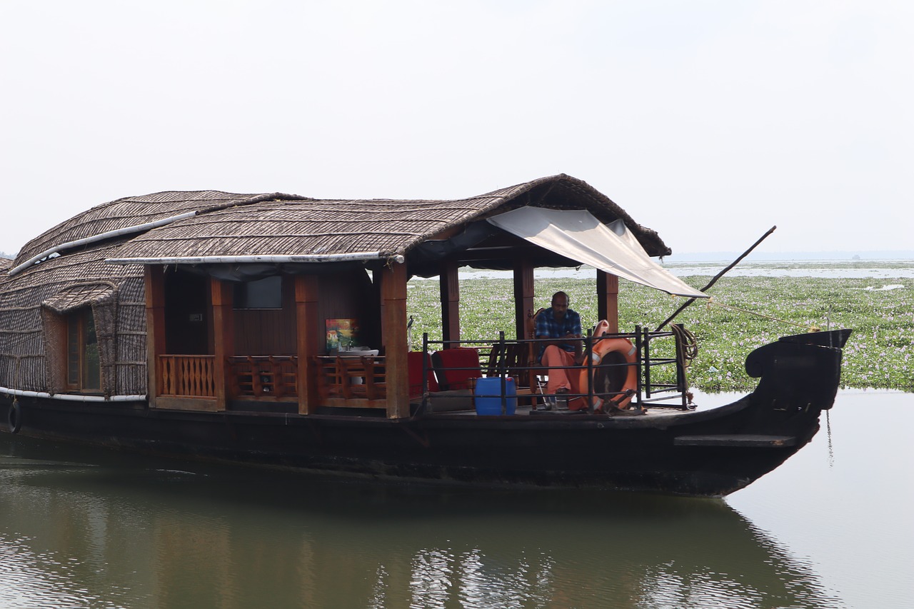 houseboat  boat  backwater free photo