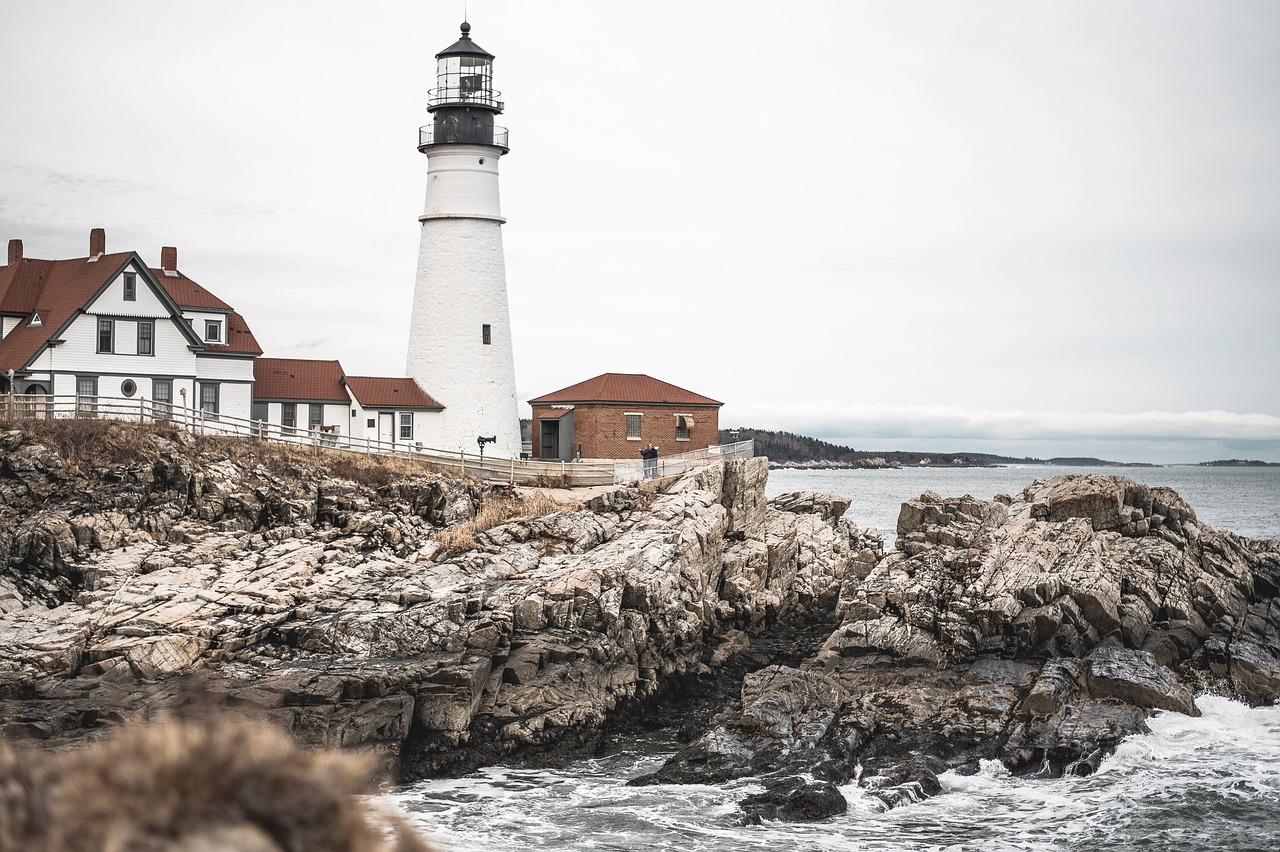 houses lighthouse sea free photo