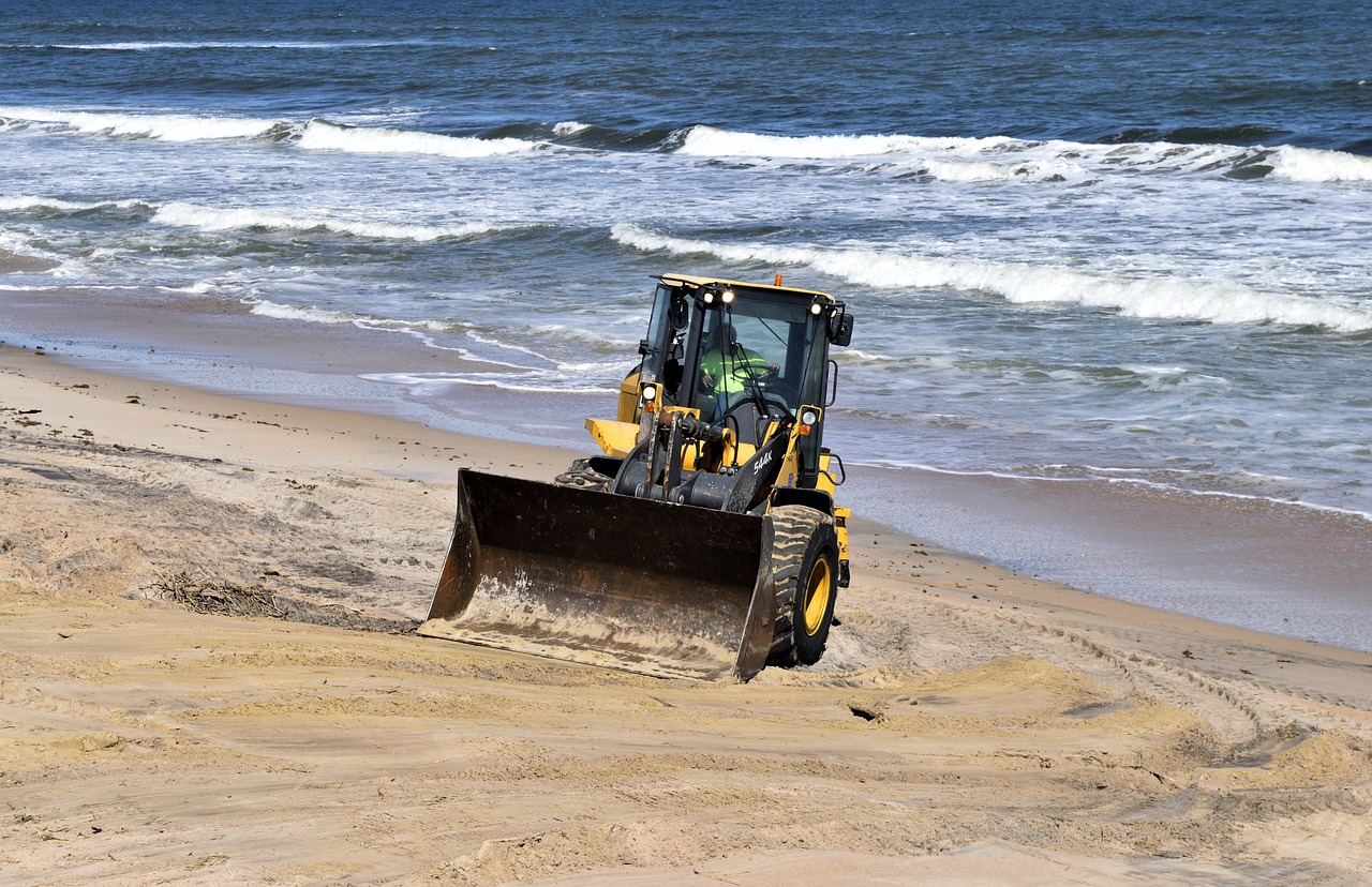hurricane matthew tractor beach clearing free photo