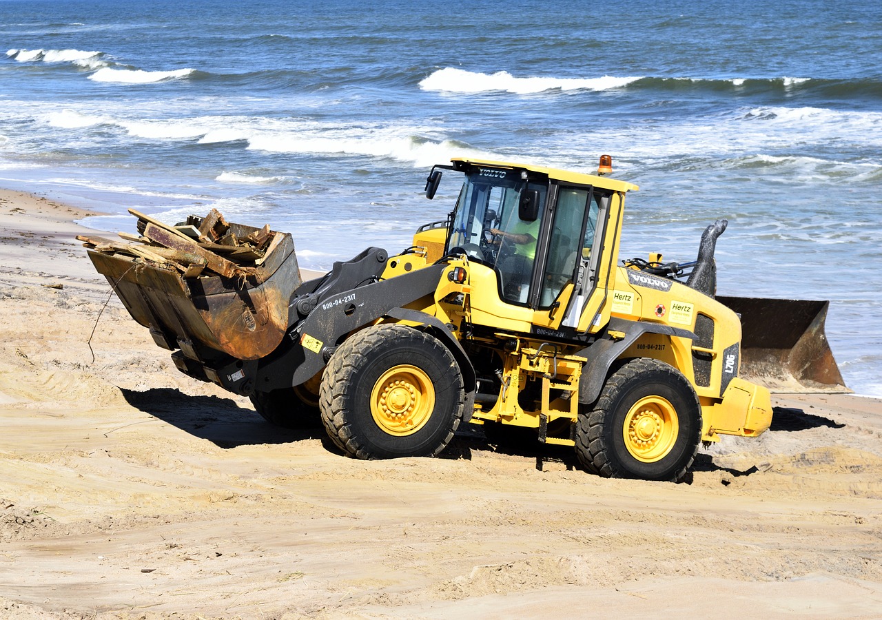 hurricane matthew tractor beach clearing free photo