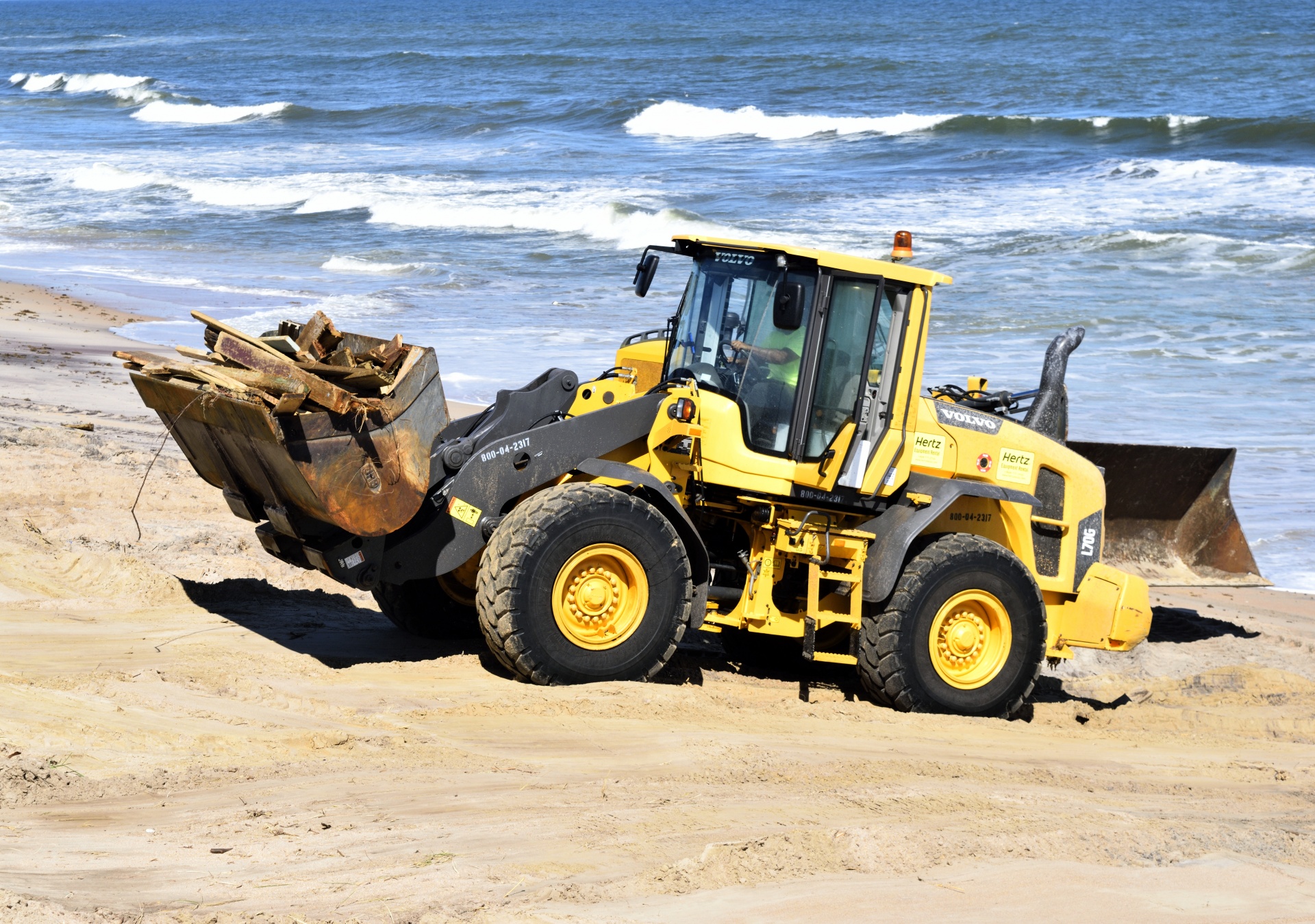 hurricane matthew tractor beach clearing free photo