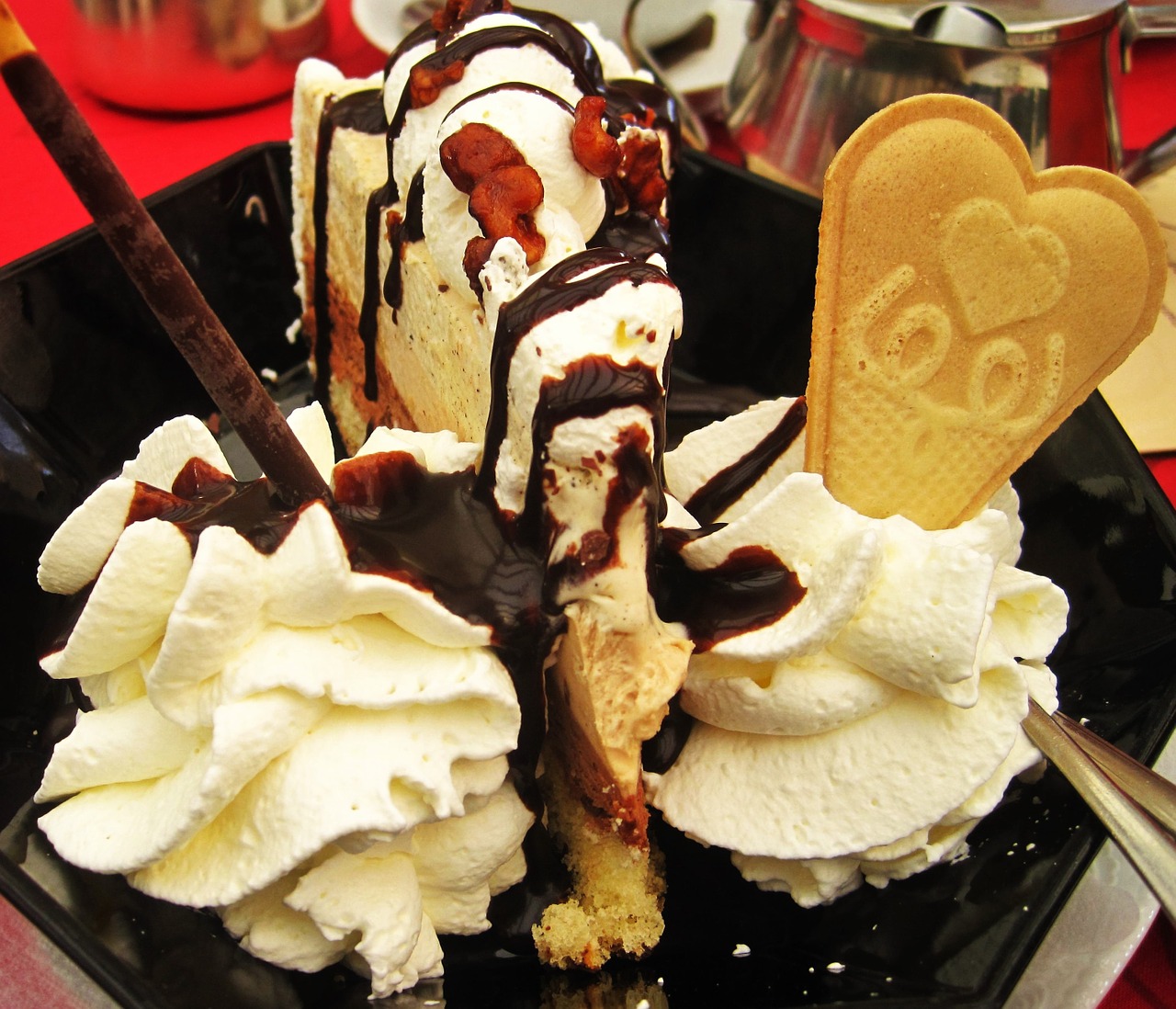 ice cream cake with chocolate sauce waffle whipped cream free photo
