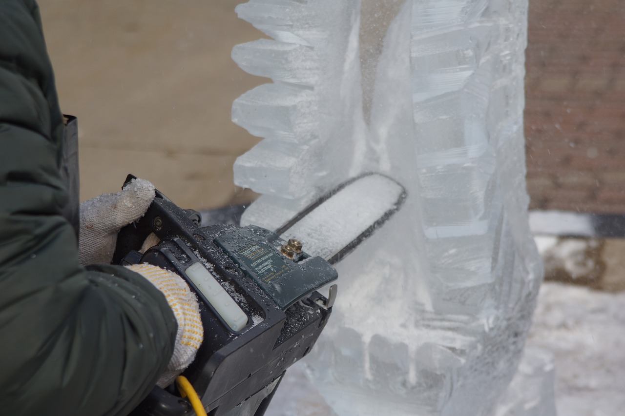 ice sculpting  carving  sawing free photo