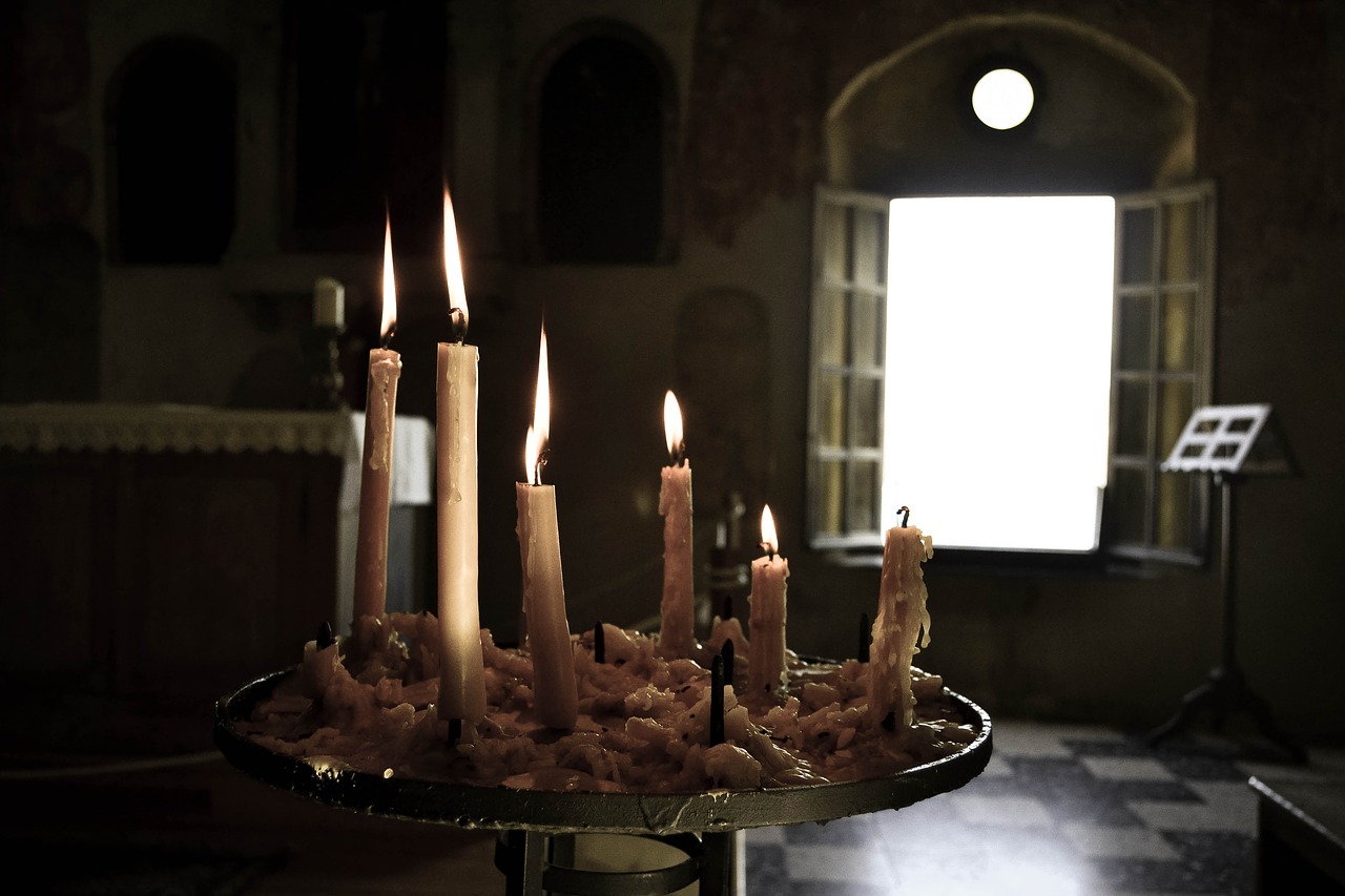 in  light of a candle  religion free photo