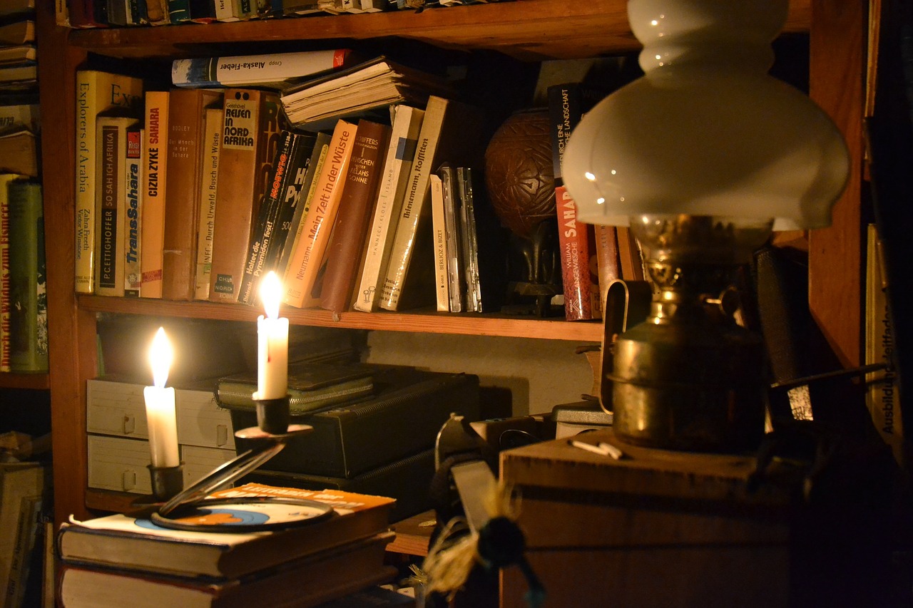 in candlelight lamp bookshelf free photo