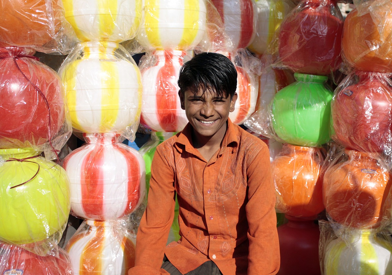 indian boy indian shop plastic product free photo