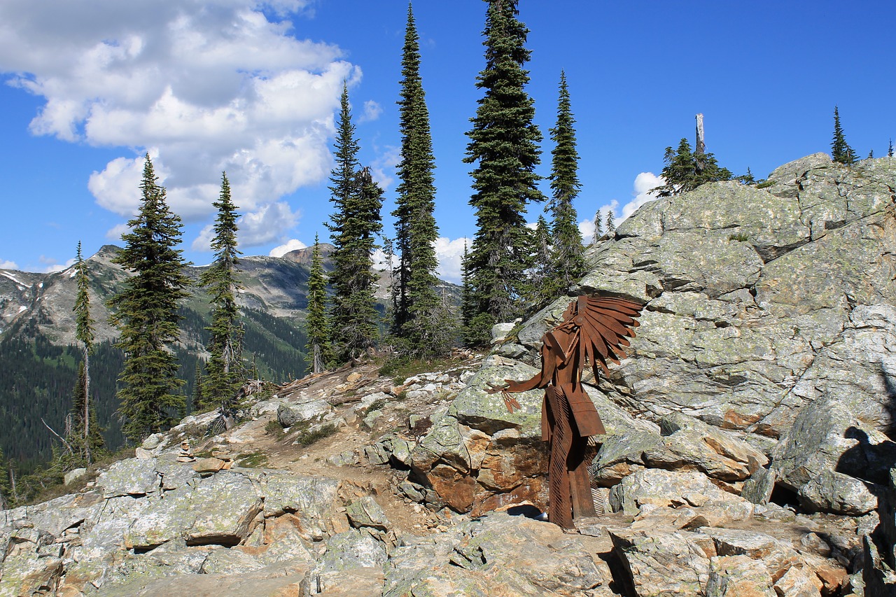 indians  metal art  rocky landscape free photo