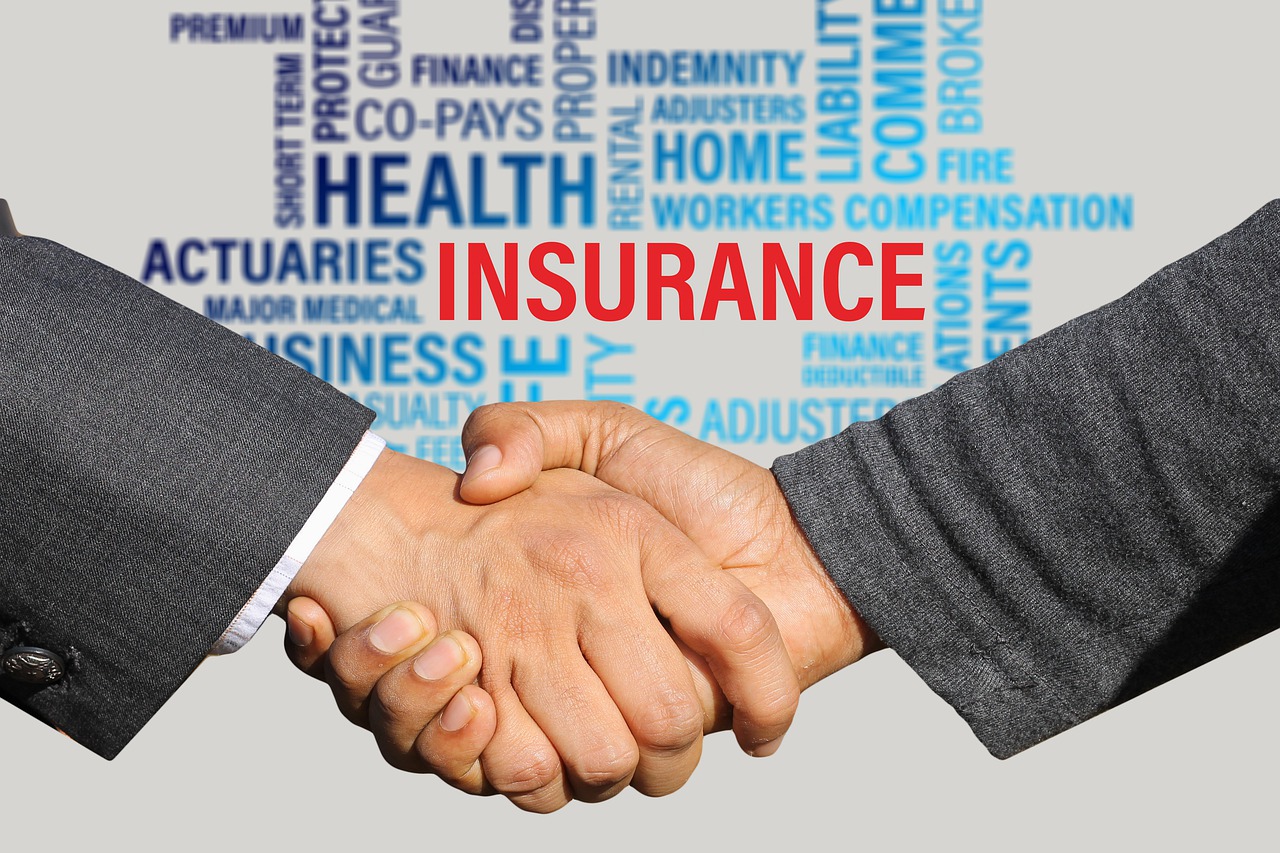 insurance contract shaking hands free photo