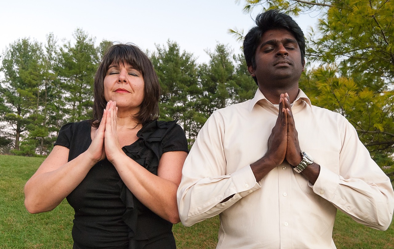 interracial couple praying free photo