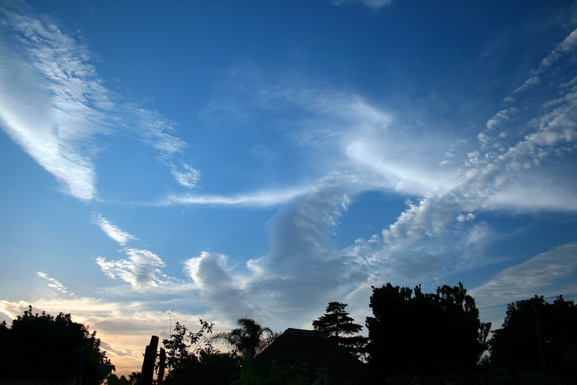 clouds streaked criss-crossed free photo