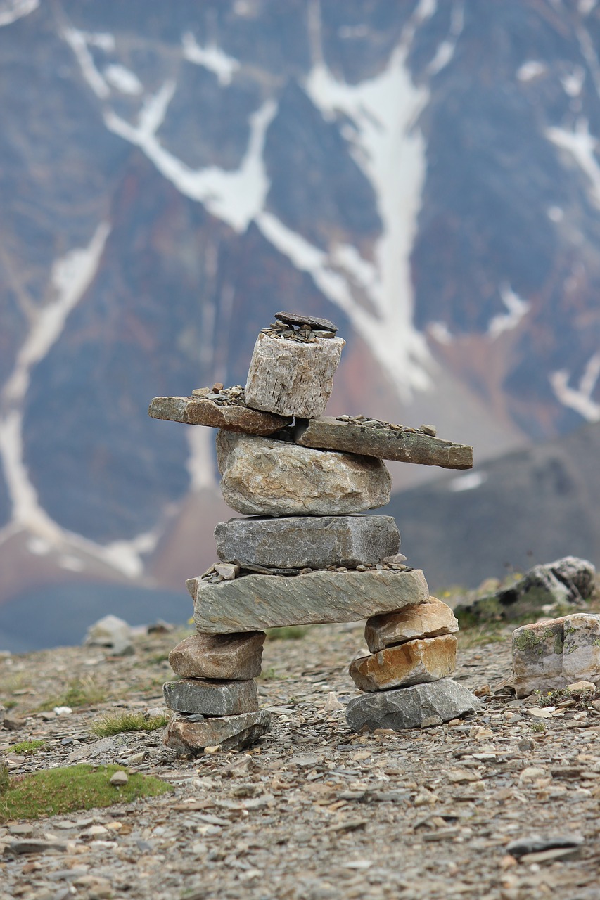 inukshuk rock cairn free photo