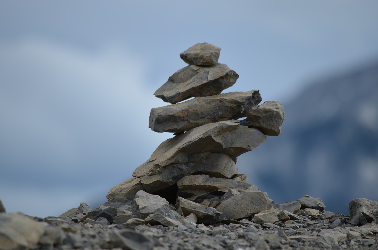 inukshuk rocks stacked free photo