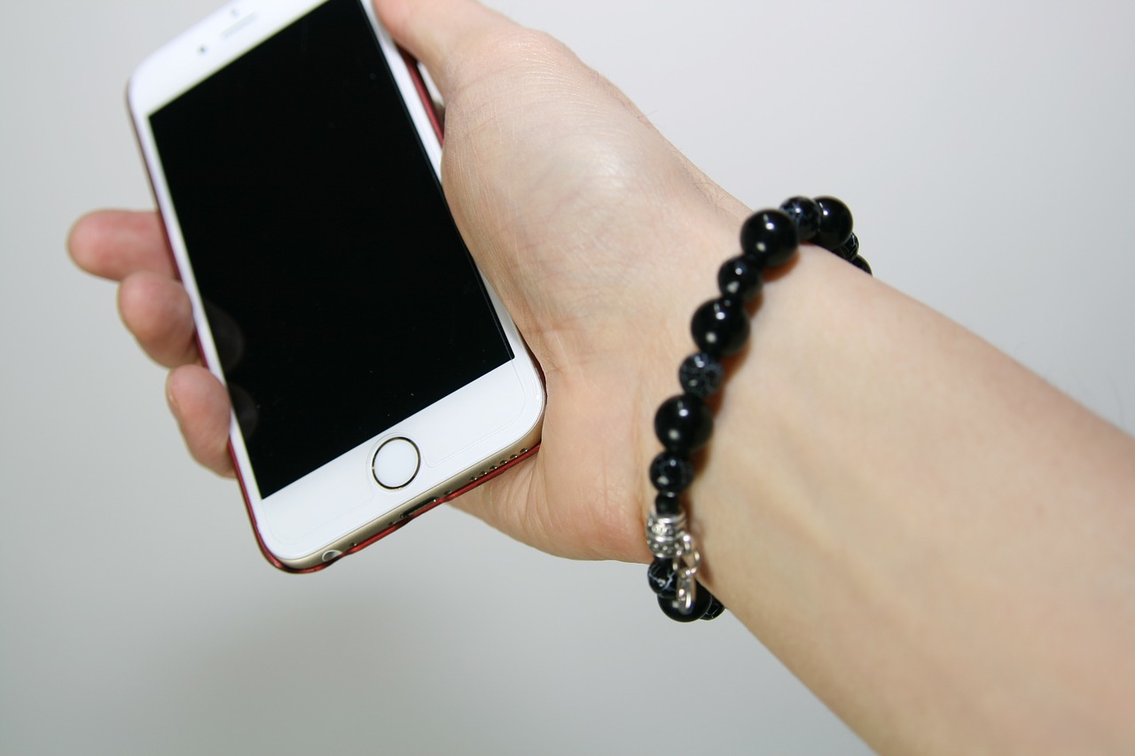 iphone hand bracelet free photo