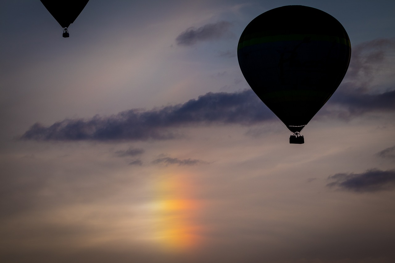 iridescent cloud  hot air balloon  montgolfiade free photo