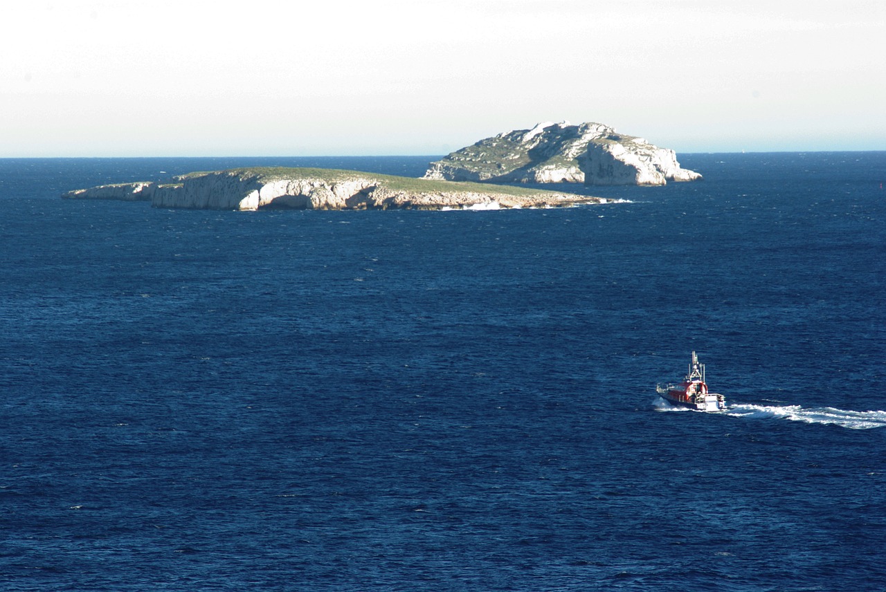 island  sea  boat free photo