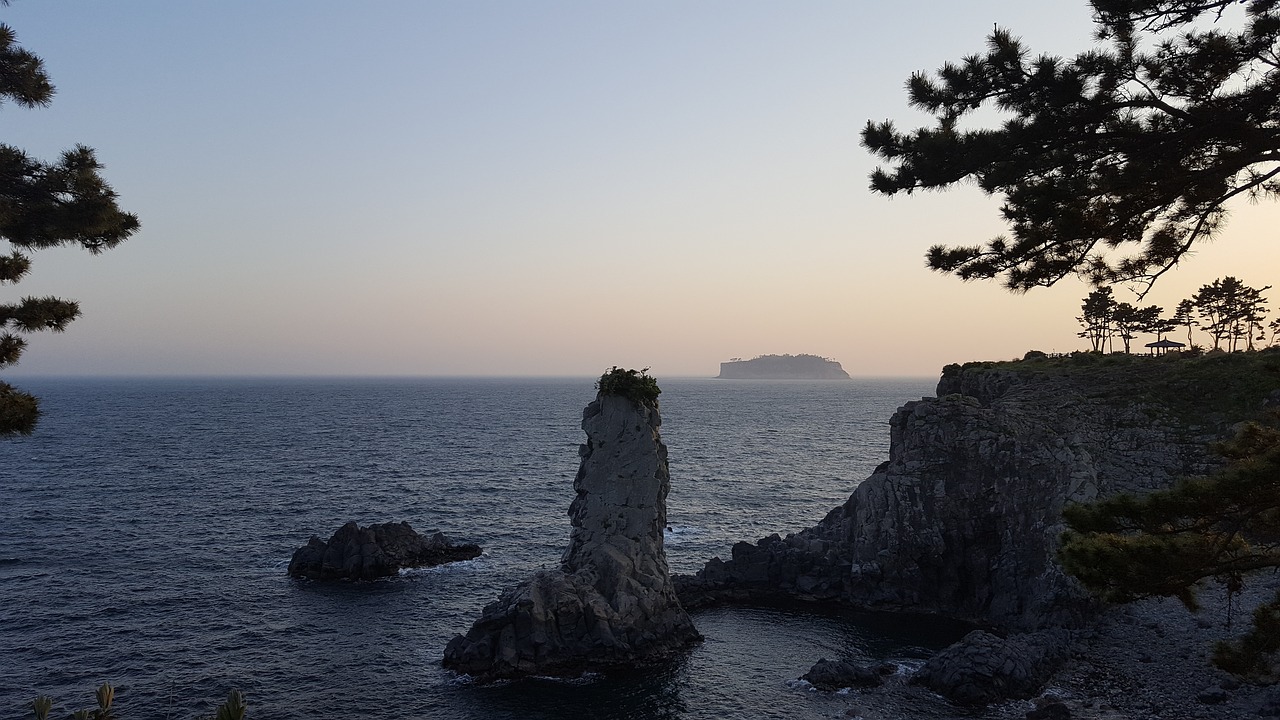 jeju island  sunset  jeju island beach free photo