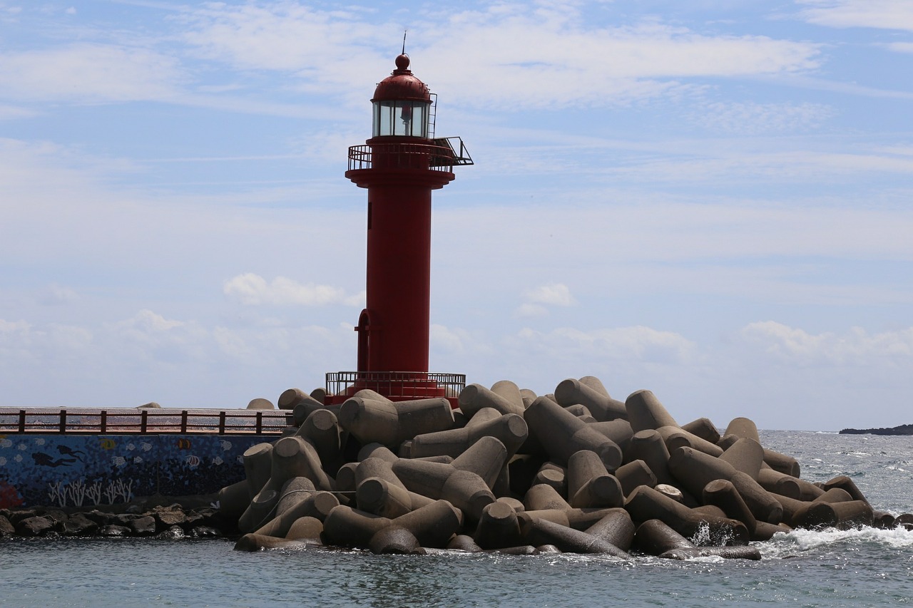 jeju island red lighthouse blue sky free photo