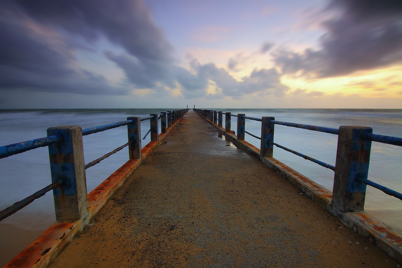 jetty clouds sea free photo