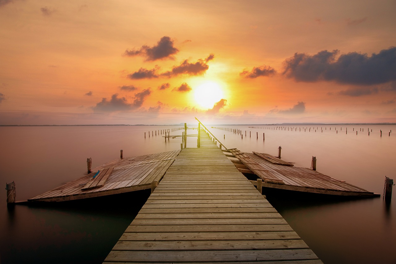 jetty  sunset  clouds free photo