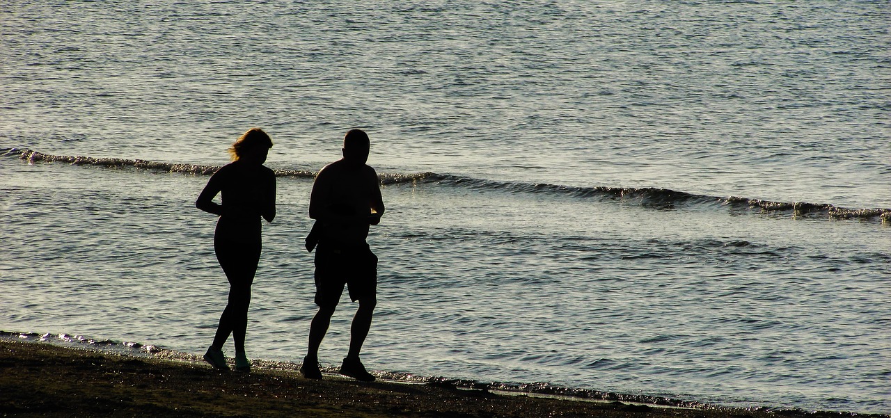 jogging couple beach free photo