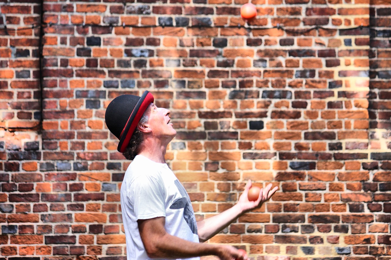 juggler brick wall free photo