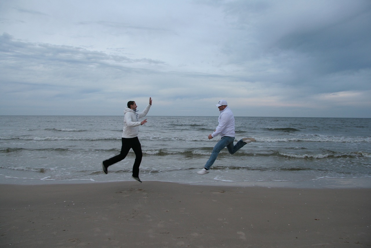 jump baltic sea beach free photo