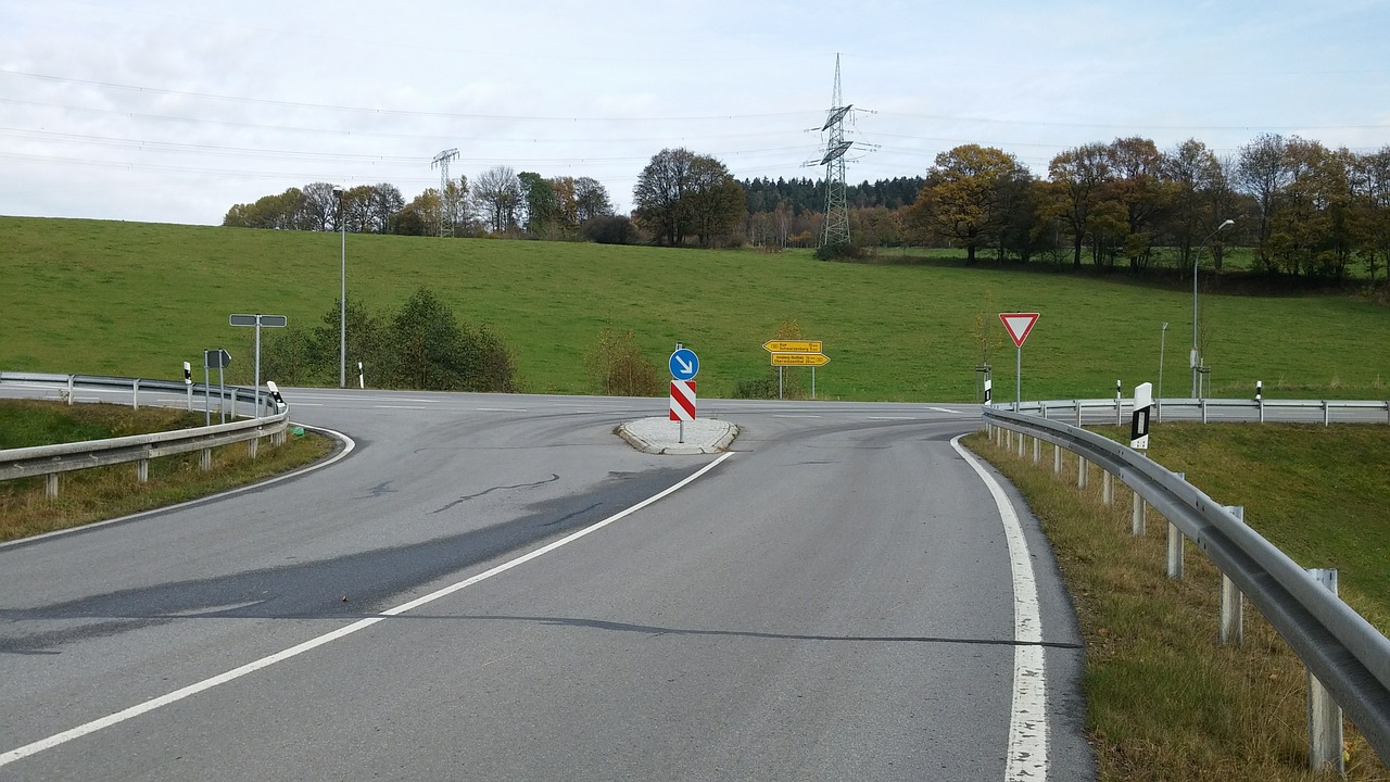 junction traffic island road free photo