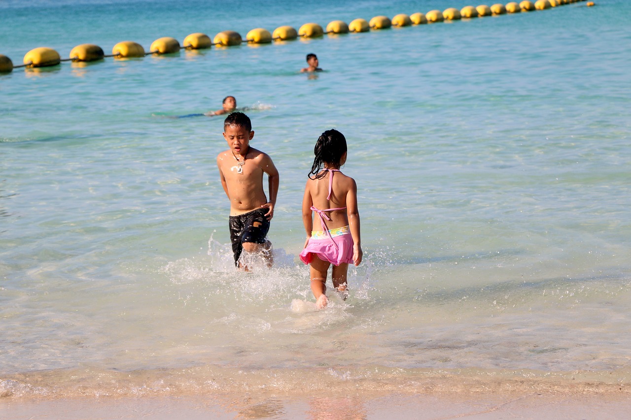 kid beach water free photo