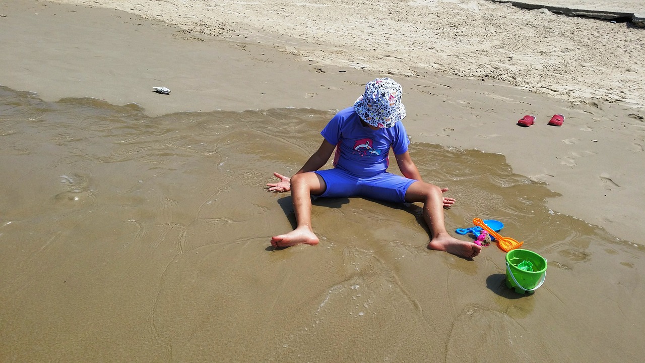 kid beach sand free photo