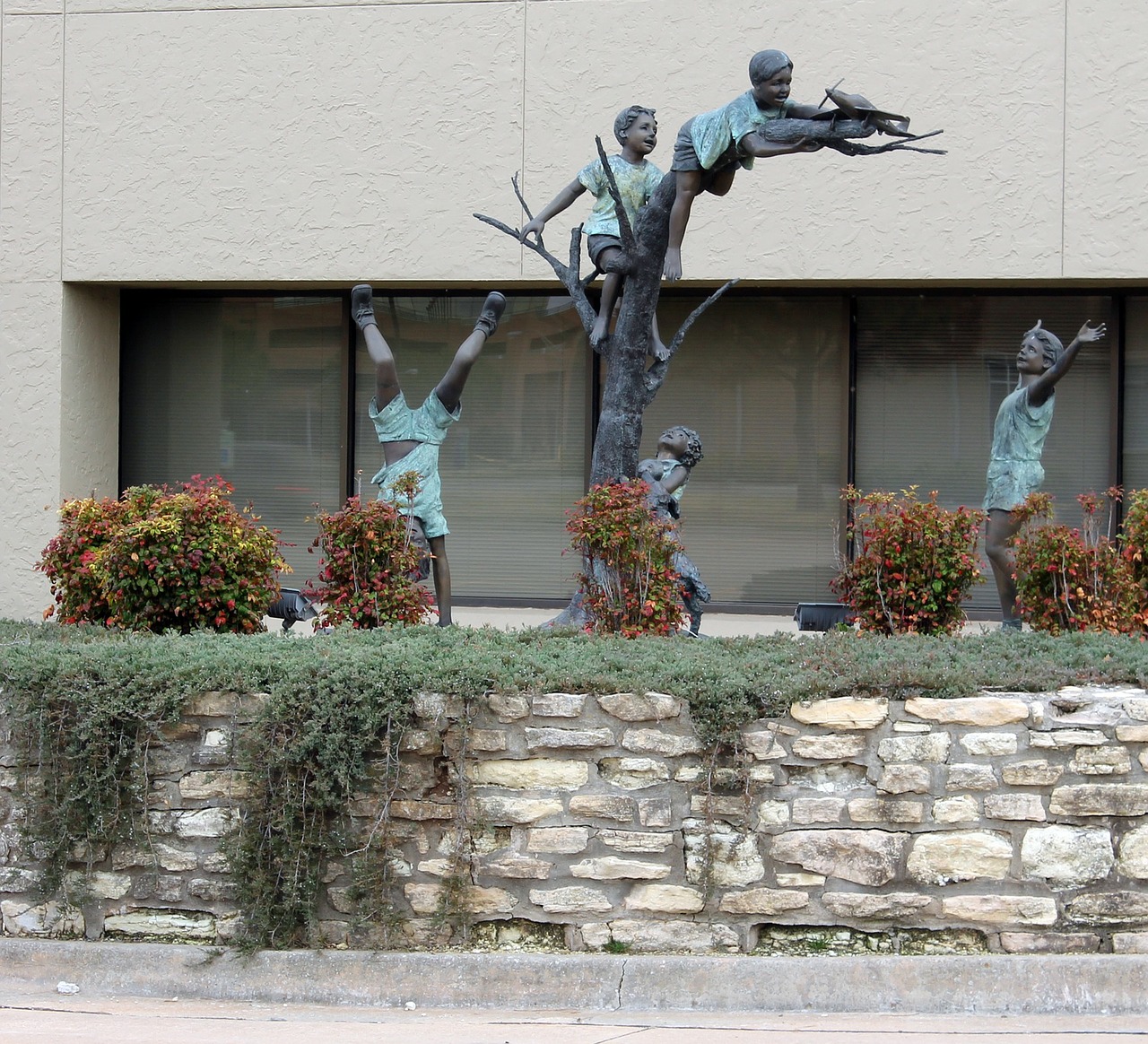 kids playing sculpture free photo