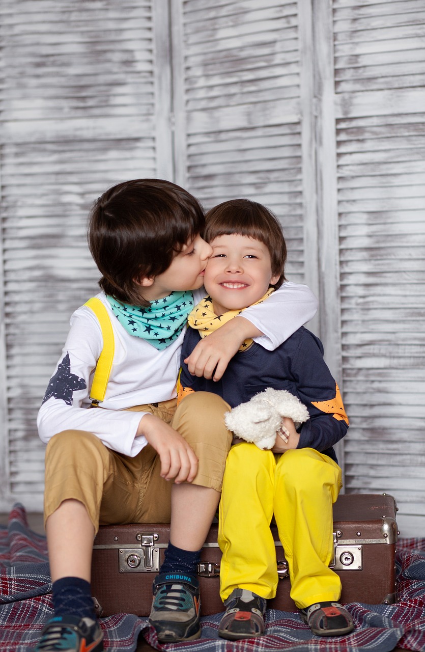 kids  kiss  brothers free photo
