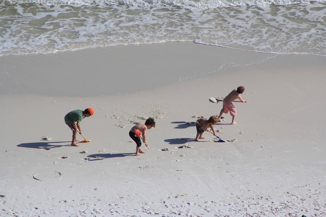 kids working  kids on a beach  sand free photo