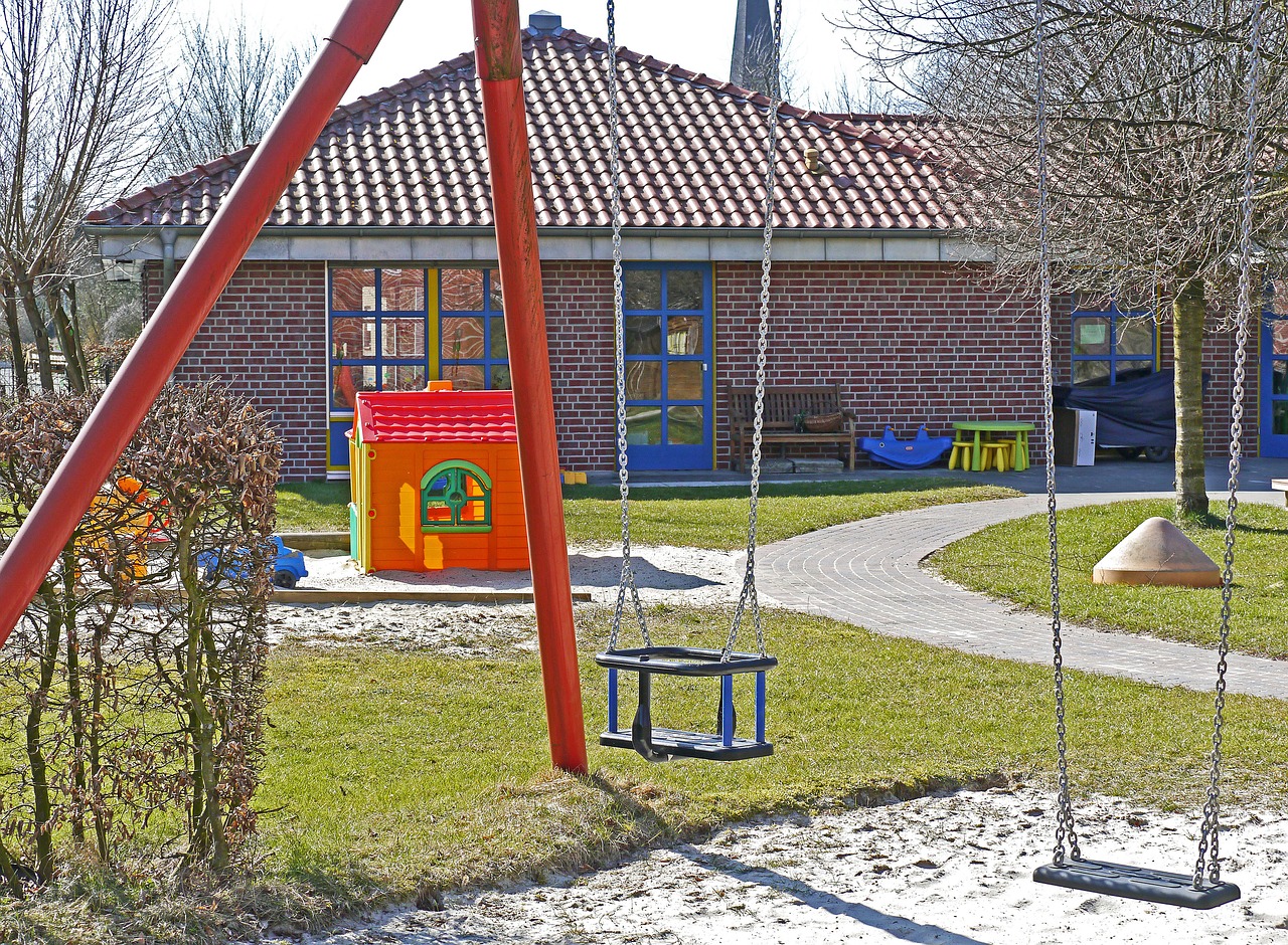 kindergarten playground swing free photo