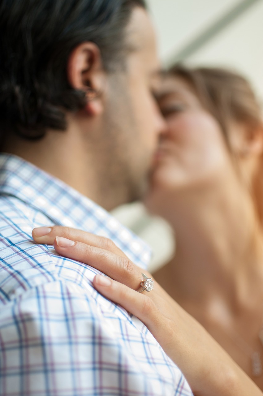 kissing couple ring love free photo