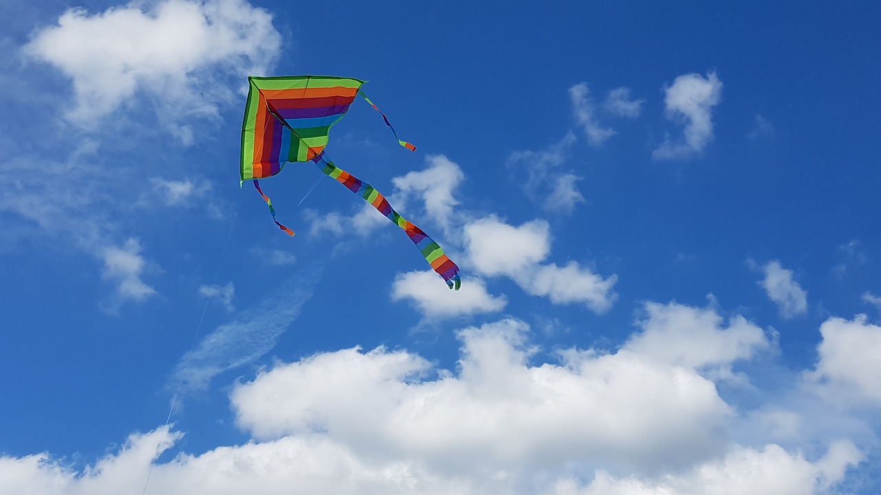 kite sky clouds free photo