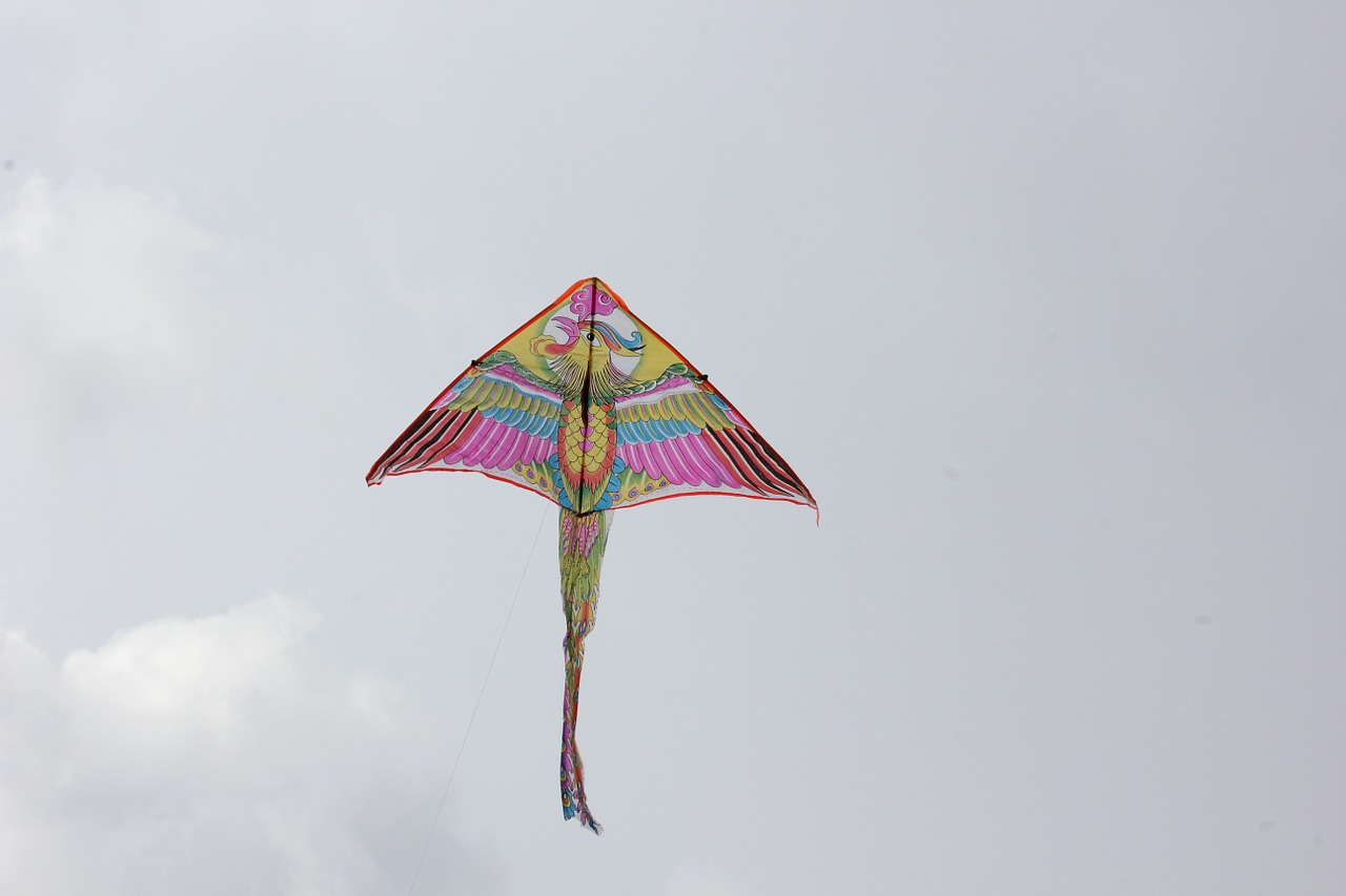 kite sky clouds free photo