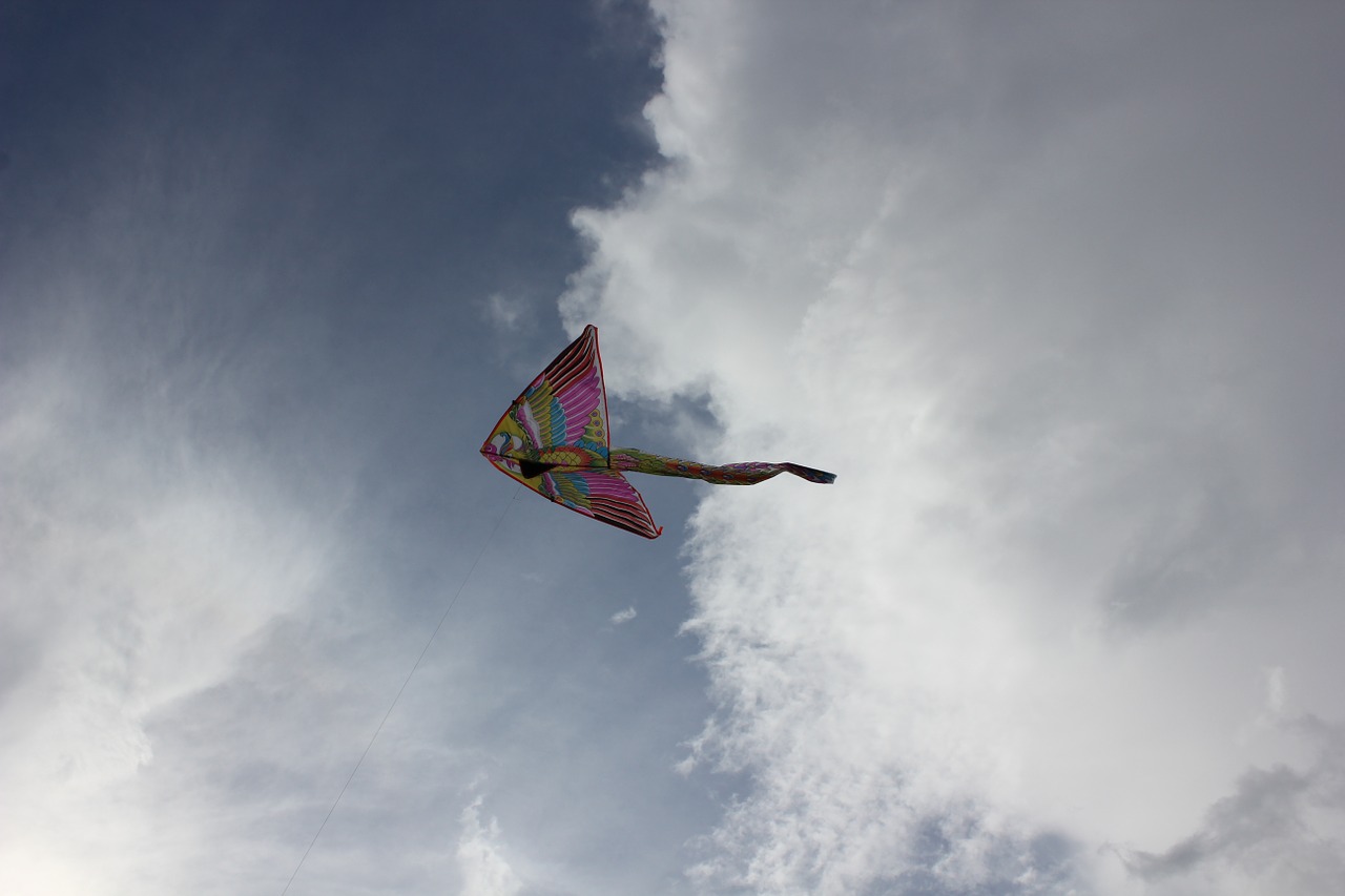 kite sky clouds free photo