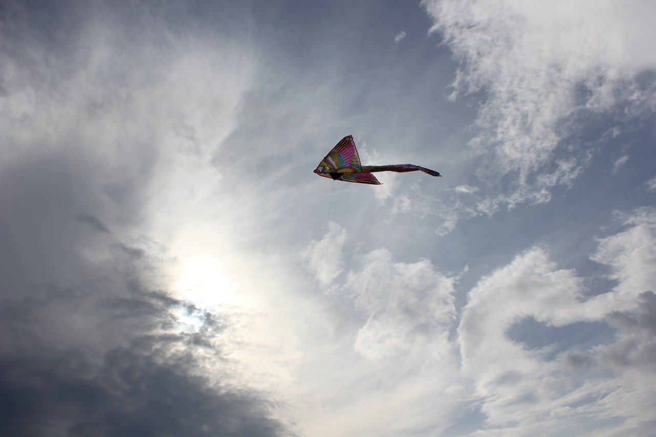 kite sky clouds free photo