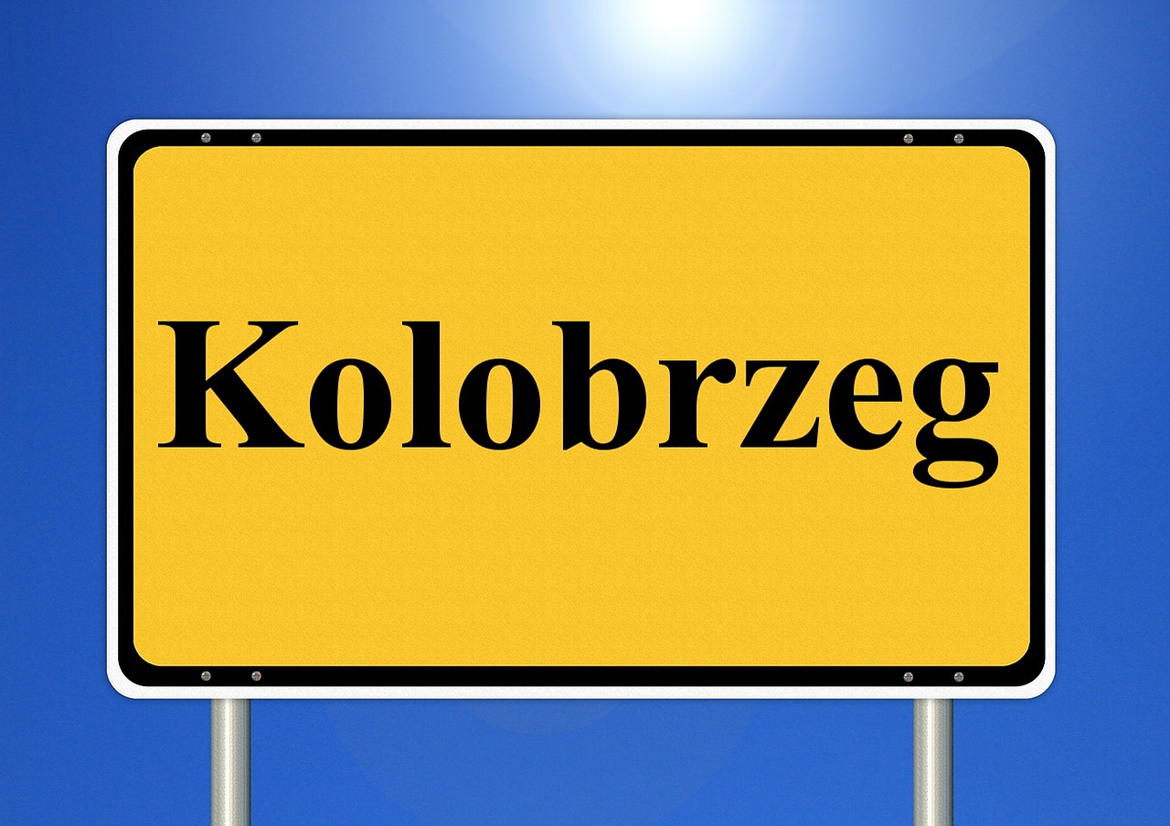 kolobrzeg town sign traffic sign free photo